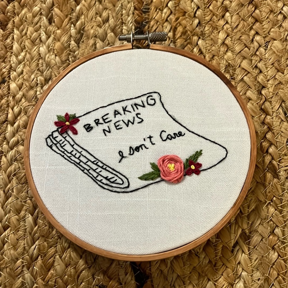 Handmade embroidery- ‘Breaking News: I Don’t Care.’ 5.5 inches. EUC.